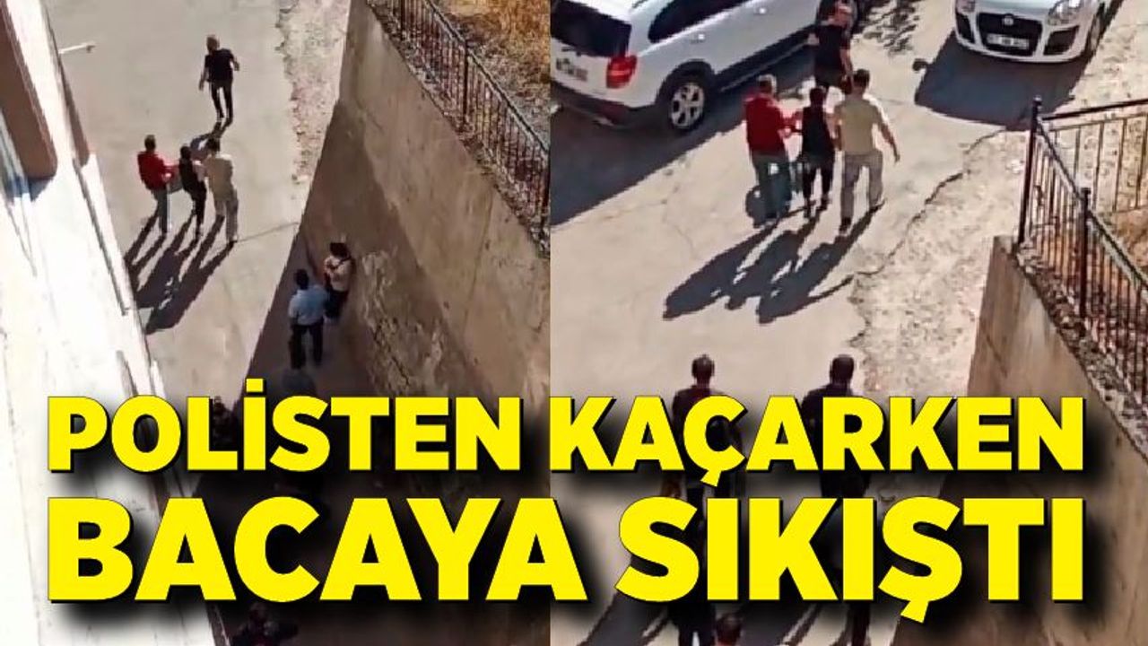Polise yakalanmamak için girdiği bacada sıkıştı