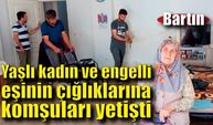 Yaşlı kadın ve engelli eşinin çığlıklarına komşuları yetişti