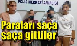 Paraları saça saça gittiler