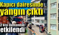 Kapıcı dairesinde çıkan yangında 2 kişi dumandan etkilendi