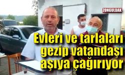 Köy muhtarı, evleri ve tarlaları dolaşıp, vatandaşları aşıya çağırıyor