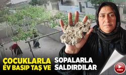 Kadınlar çocuklarla ev basıp taş ve sopalarla saldırdılar