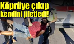 Köprüye çıkıp kendini jiletledi!