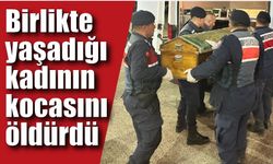 Birlikte yaşadığı kadının kocasını öldürdü