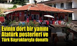 Evinin dört bir yanını Atatürk posterleri ve Türk Bayraklarıyla donattı