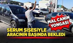 Mal canın yongası! Serum şişesiyle aracının başında bekledi