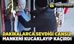 Dakikalarca sevdiği cansız mankeni kucaklayıp kaçırdı