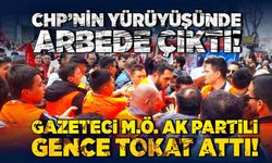 CHP’nin yürüyüşünde arbede çıktı! Gazeteci M.Ö. Ak Partili gence tokat attı!