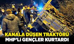 Kanala düşen traktör  MHP’li gençler tarafından kurtarıldı