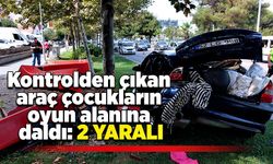 Kontrolden çıkan araç çocukların oyun alanına daldı: 2 yaralı