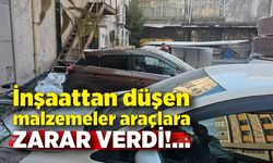 İnşaattan düşen malzemeler araçlara zarar verdi