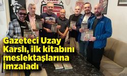 Gazeteci Uzay Karslı, ilk kitabını meslektaşlarına İmzaladı