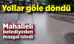 Yağmur sonrası yollar göle döndü, mahalleli belediyeden mazgal istedi