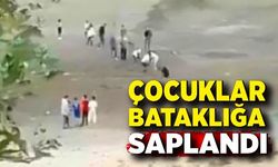 Bataklığa saplanan çocukları vatandaşlar kurtardı