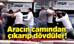 Aracın camından çıkarıp dövdüler!