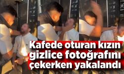 Kafede oturan kızın gizlice fotoğraflarını çekerken yakalandı