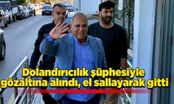 Dolandırıcılık şüphesiyle gözaltına alındı, el sallayarak gitti