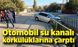 Otomobil su kanalı korkuluklarına çarptı