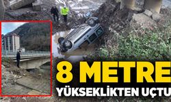 8 metre yükseklikten çaya uçtu