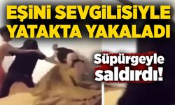 Eşini sevgilisiyle yatakta yakaladı, süpürgeyle saldırdı!