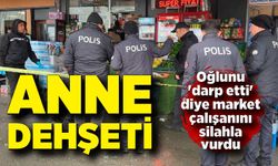 Anne oğlunu 'darp etti' diye market çalışanını silahla vurdu