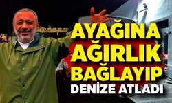Ayağına ağırlık bağlayıp denize atladı