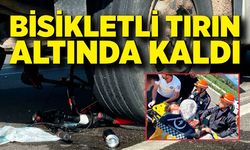 Kırmızı ışıkta geçen bisikletli tırın altında kaldı