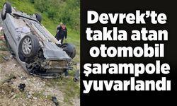 Devrek’te takla atan otomobil şarampole yuvarlandı