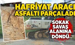 Hafriyat aracı asfaltı parçaladı, sokak savaş alanına döndü