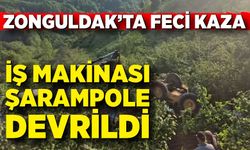 İş makinası şarampole devrildi, operatör atlayarak kurtuldu