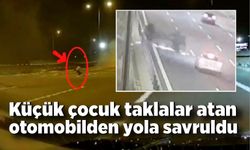 9 yaşındaki çocuk taklalar atan otomobilden yola savruldu