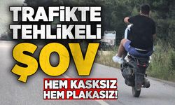 Trafikte tehlikeli şov: Hem kasksız hem plakasız!