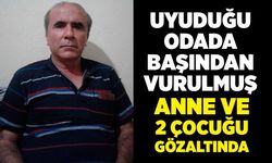 Eşini odasında başından vurularak öldürülmüş halde buldu; tabanca bulunamadı