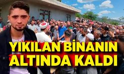 Yıktığı binanın altında kaldı