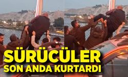 Köprüden atlamak isteyen kişiyi yoldan geçen sürücüler engelledi