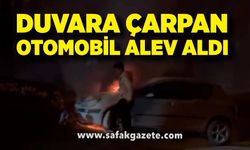 İstinat duvarına çarpan otomobil alev aldı