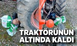 Kontrol etmek istediği traktörünün altında kaldı