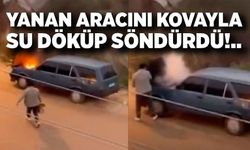 Alev alev yanan aracını kovayla su döküp söndürdü