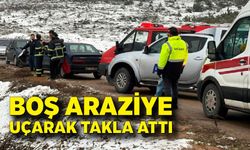 Otomobil boş araziye uçarak takla attı