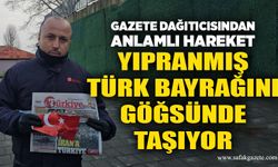 Gazete dağıtıcısından anlamlı hareket: Yıpranmış Türk Bayrağını göğsünde taşıyor