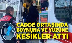 Cadde ortasında boynuna ve yüzüne kesikler attı