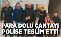 Bulduğu para dolu çantayı polise teslim etti