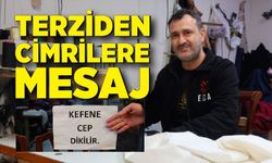 İş yerinin camına astığı "Kefene cep dikilir" yazısıyla ilgi odağı oldu