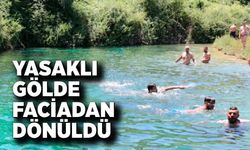 Yasaklı gölette facianın eşiğinden dönüldü