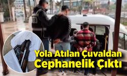 Polisten kaçarken içi kalaşnikof dolu çuvalı yola attılar