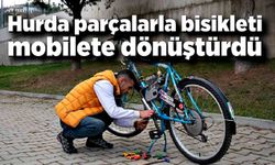 Hurda parçalarla bisikleti mobilete dönüştürdü