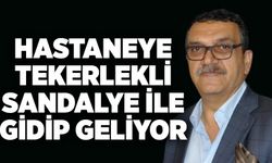 Hastaneye tekerlekli sandalye ile gidip geliyor