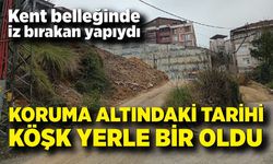 Bu arsada koruma altında bir bina vardı