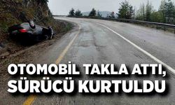 Takla atan otomobilden yara almadan kurtuldu