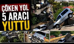 Aşırı yağışla birlikte çöken yol 5 aracı yuttu